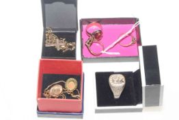 Four assorted gold and silver rings, crucifix and chain,