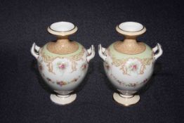 Pair of Royal Doulton floral vases,