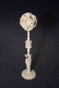 Chinese ivory puzzle ball on figural stand,