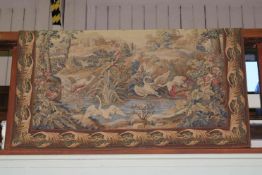 French tapestry wall hanging depicting aquatic birds with a windmill and buildings in the