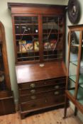 Georgian mahogany bureau bookcase having two astragal glazed doors above a fall front with four