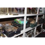 Large collection of oil lamp parts including brass reservoirs