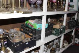 Large collection of oil lamp parts including brass reservoirs