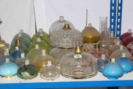 Collection of clear and coloured glass oil lamp reservoirs