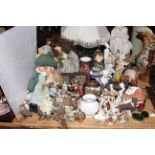 Two table lamps, dolls and large collection of ornaments, vases,