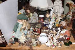 Two table lamps, dolls and large collection of ornaments, vases,