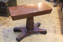 Victorian mahogany fold top card table on pedestal quadriform base