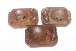 Three Mouseman ashtrays,