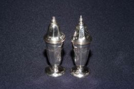Pair of silver salt and peppers, Sheffield 1935,