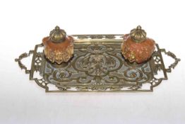 Ornate brass dresser inkstand, circa 1880 with cupid faced pots,
