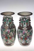Pair of Oriental vases decorated with warriors and applied dogs of fo handles,
