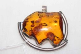 Amber pendant, 3 inches by 2.