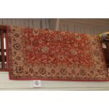 Israeli wool carpet with a red ground 3.00 by 2.