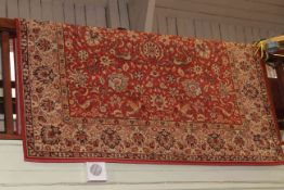 Israeli wool carpet with a red ground 3.00 by 2.