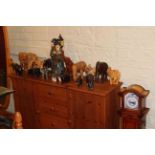 Longcase clock style CD cabinet, carved wood and other elephants, Laurel & Hardy cabinet,