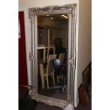 Rectangular silvered framed bevelled wall mirror,