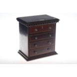 Victorian mahogany and line inlaid miniature chest of four drawers,