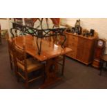 Pine rectangular dining table, four rush seated chairs,