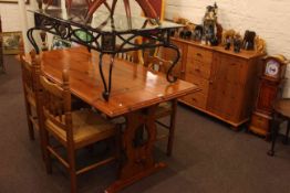 Pine rectangular dining table, four rush seated chairs,