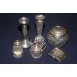 Six silver items including vase, pepperette, hair tidy, book,