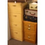 Four drawer and two drawer wood finish filing cabinets with keys