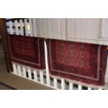 Pair red ground Persian design rugs 1.45 by 1.