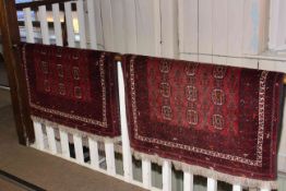 Pair red ground Persian design rugs 1.45 by 1.