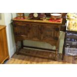 Neat oak linen fold panel two door sideboard, 91.5cm by 106.