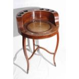 19th Century mahogany and line inlaid circular washstand having galleried back with six open