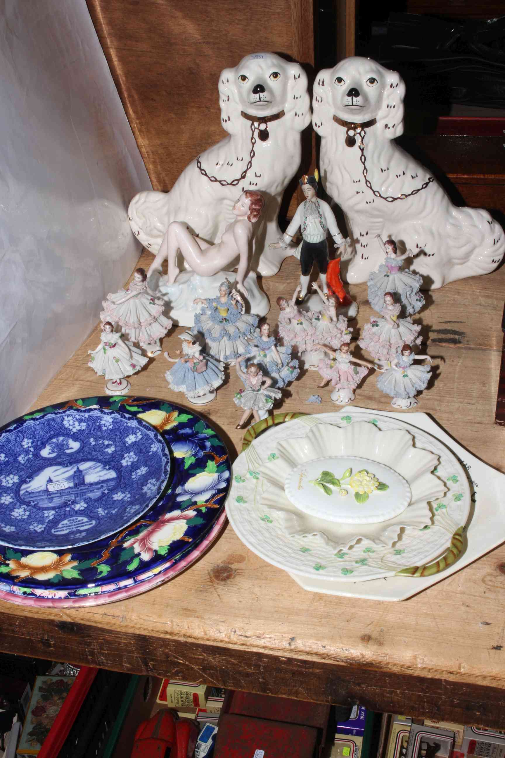 Pair of Staffordshire style spaniels, three Maling floral plates and 1929 Exhibition plate,