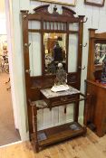 Victorian carved walnut and marble mirror backed hallstand,