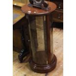 Polished mahogany cylindrical display cabinet,