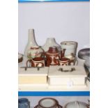 Two alabaster lidded vases, two lustre vases, three piece Longport tea set, three plant pots,