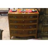 Georgian style mahogany and satinwood banded four drawer bow front chest on splayed bracket feet,