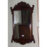 Near pair Georgian style mahogany fretwork mirrors