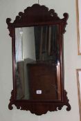 Near pair Georgian style mahogany fretwork mirrors