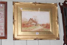 Framed watercolour of a farmyard cottage