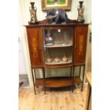 Edwardian inlaid mahogany cabinet having bow glazed central door flanked by two inlaid panel doors