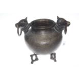 Tibetan bronze pot with bull head handles,