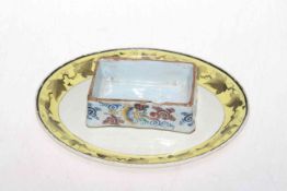 Teapot stand and faience salt,