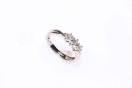 Platinum three stone diamond ring