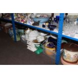 Large quantity of china including Oriental fish bowls, planters, serving dishes, kitchen scales,