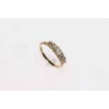 Gold five stone diamond ring