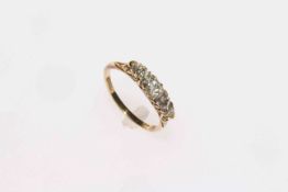 Gold five stone diamond ring