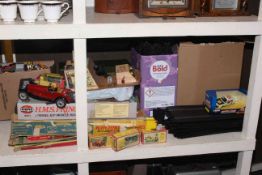 Collection of children's toys including model vehicles, Scalextric, model kit,