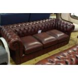 Ox blood buttoned leather three seater Chesterfield settee