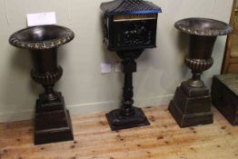 Pair cast campana style garden urns and stands,
