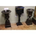 Pair cast campana style garden urns and stands,