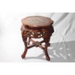 Oriental hardwood and marble inset jardiniere stand,