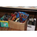 Three boxes of toys, games, military helmet,